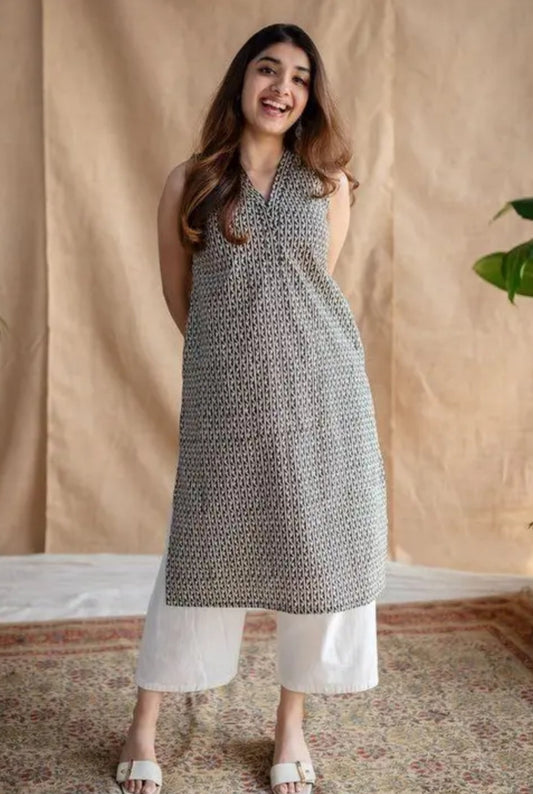 Everyday ethnic style with this elegant black & white sleeveless kurti